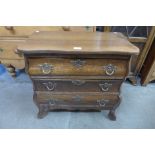 A small French oak bombe shaped commode