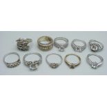 Ten silver and white stone set rings, 32g