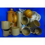 A collection of Meakin stone tea and coffee ware