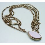 A Victorian long guard chain with agate set locket