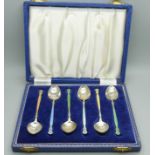 A cased set of six Arts and Crafts silver and enamel spoons, 69g