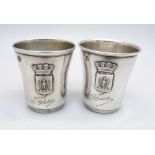 A pair of continental silver vodka cups, 26g