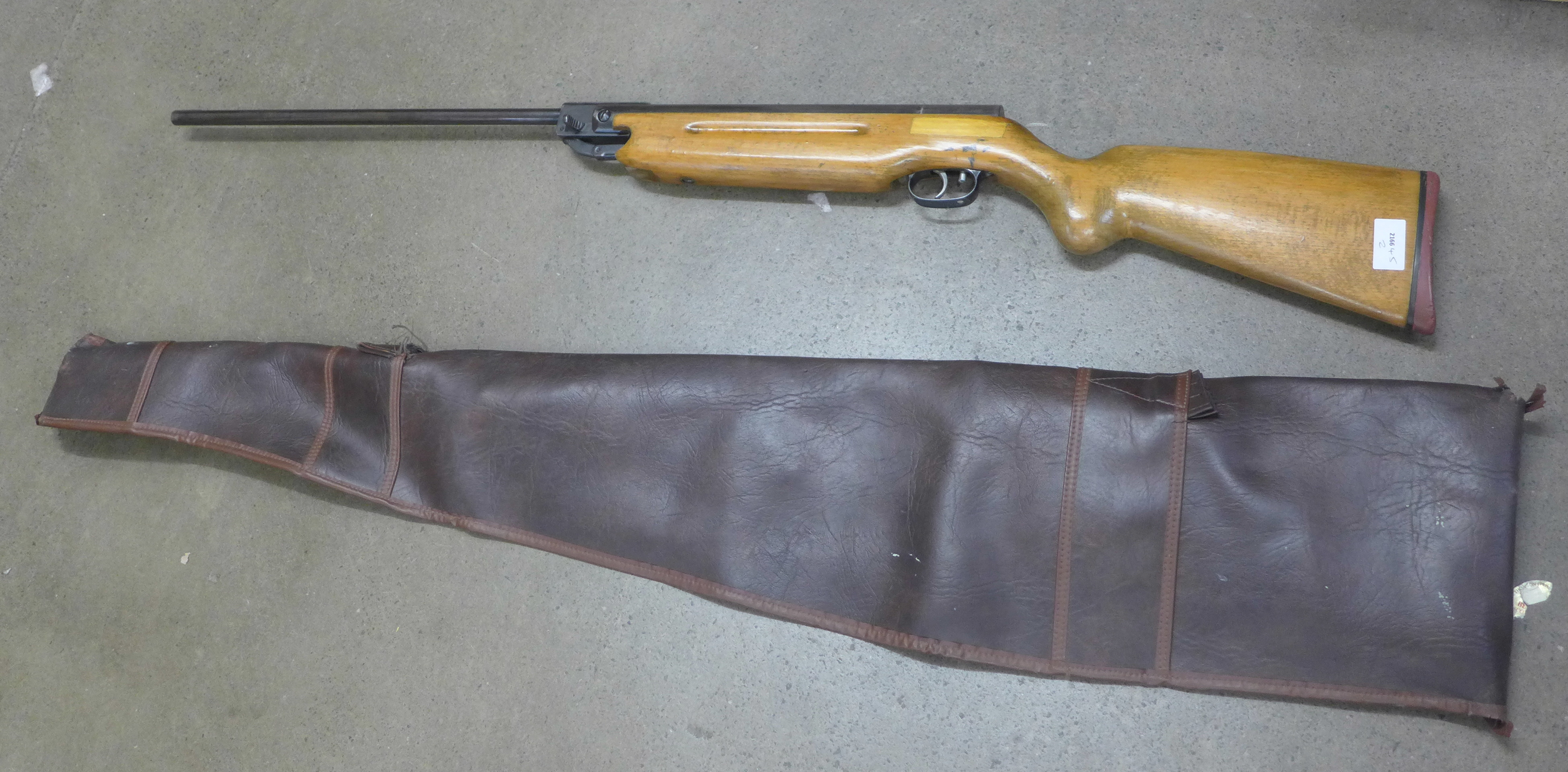 A Weihrauch HW35 .22 target shooting air rifle, circa 1975, repairs to the stock, (13mm scope