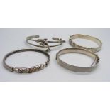 Four silver bangles, 66g