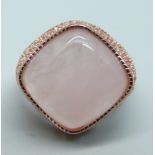 A silver gilt and rose quartz ring, with certificate, N