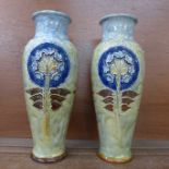 A pair of early 20th Century Royal Doulton stoneware vases, 28cm