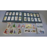 An album of cigarette cards and a bag of loose cards