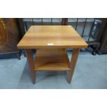 A Danish square teak coffee table