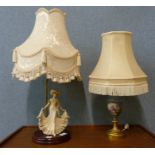 A figural table lamp and a brass table lamp