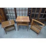 Two teak magazine racks and an occasional table