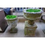 A concrete garden urn on stand and a concrete campana shaped garden urn