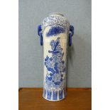 An oriental blue and white painted vase