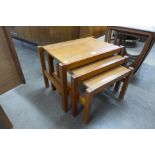 A teak nest of tables