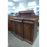 A William IV rosewood breakfront three door sideboard