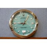 A Rolex style dealer's wall clock, a/f