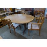 A G-Plan Fresco teak extending dining table and four chairs