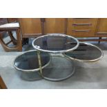 An Italian tubular metal and smoked glass coffee table, manner of Milo Baughman