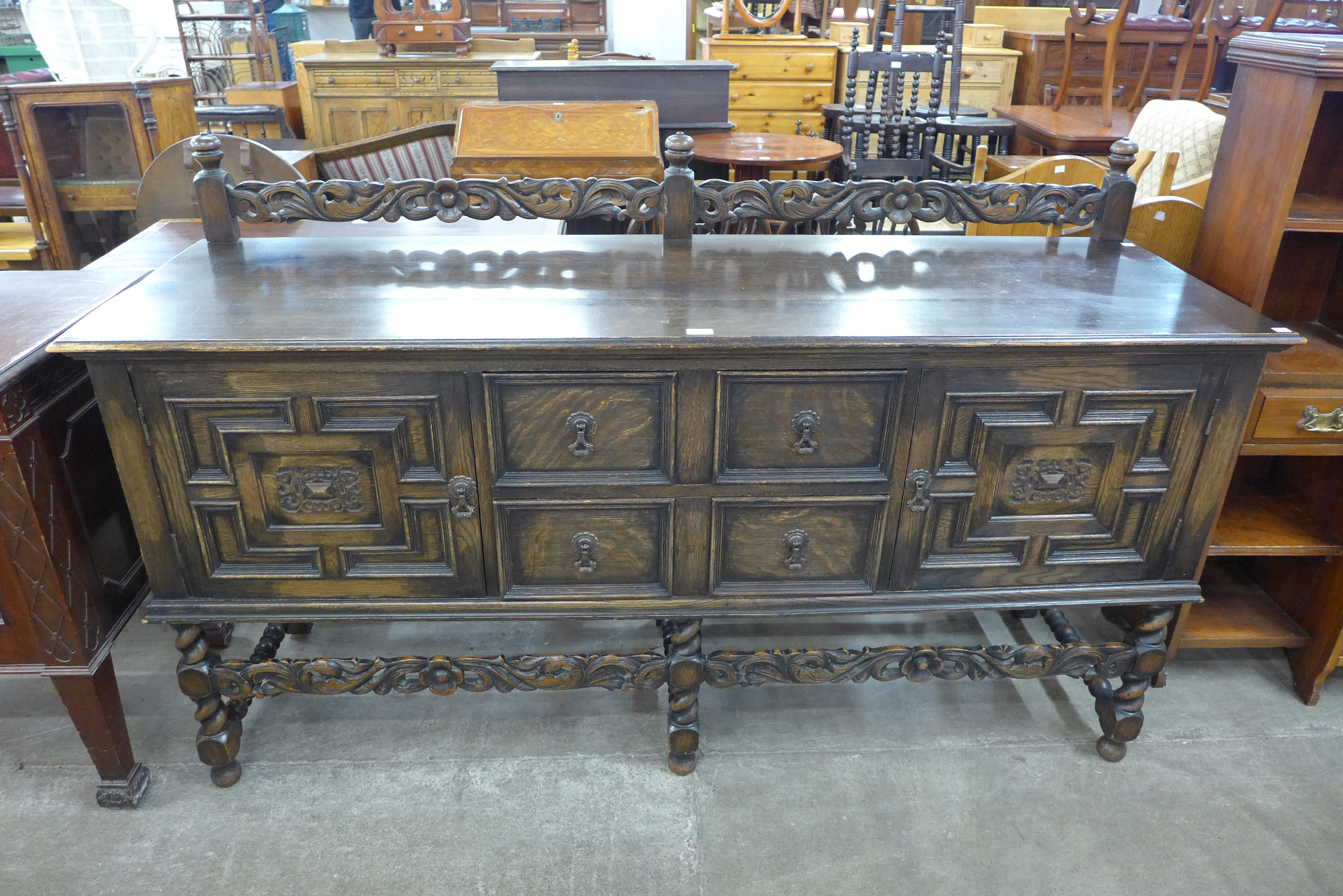 An early 20th century Jacobean Revival carved oak geometric moulded barleytwist sideboard - Image 2 of 2
