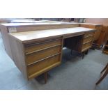 An Austin Suite teak desk