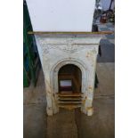 A Victorian cast iron fire surround