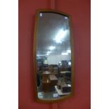 A teak framed mirror