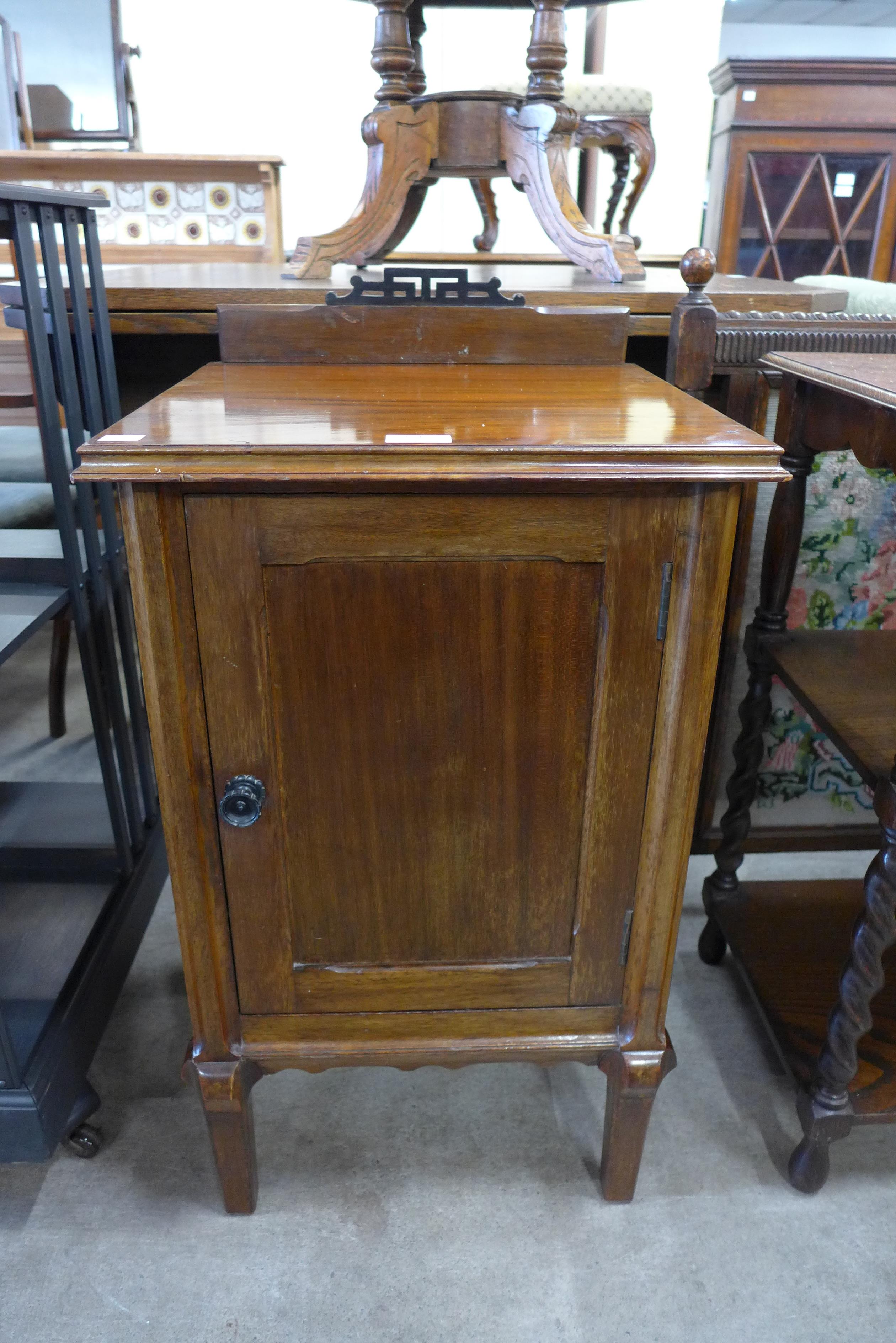 A Victorian style walnut pot cupboard