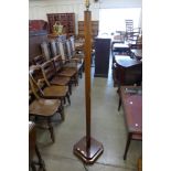 An Art Deco walnut floor standing lamp