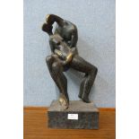 A bronze abstract figure of two lovers