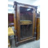 A Victorian inlaid walnut music cabinet