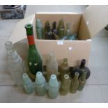 A box of assorted vintage bottles