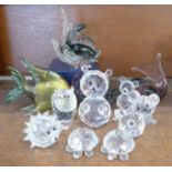 A collection of Swarovski crystal animals, four glass fish and a Stuart Crystal paperweight