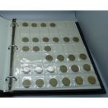 A coin album containing a part collection of British coins