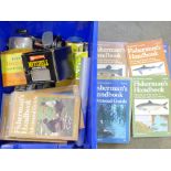 A collection of fisherman's handbooks, reels, weights, spinners, sea fishing related