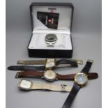 Six wristwatches including a vintage Timex