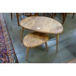 Two Ercol elm and beech pebble shaped occssional tables