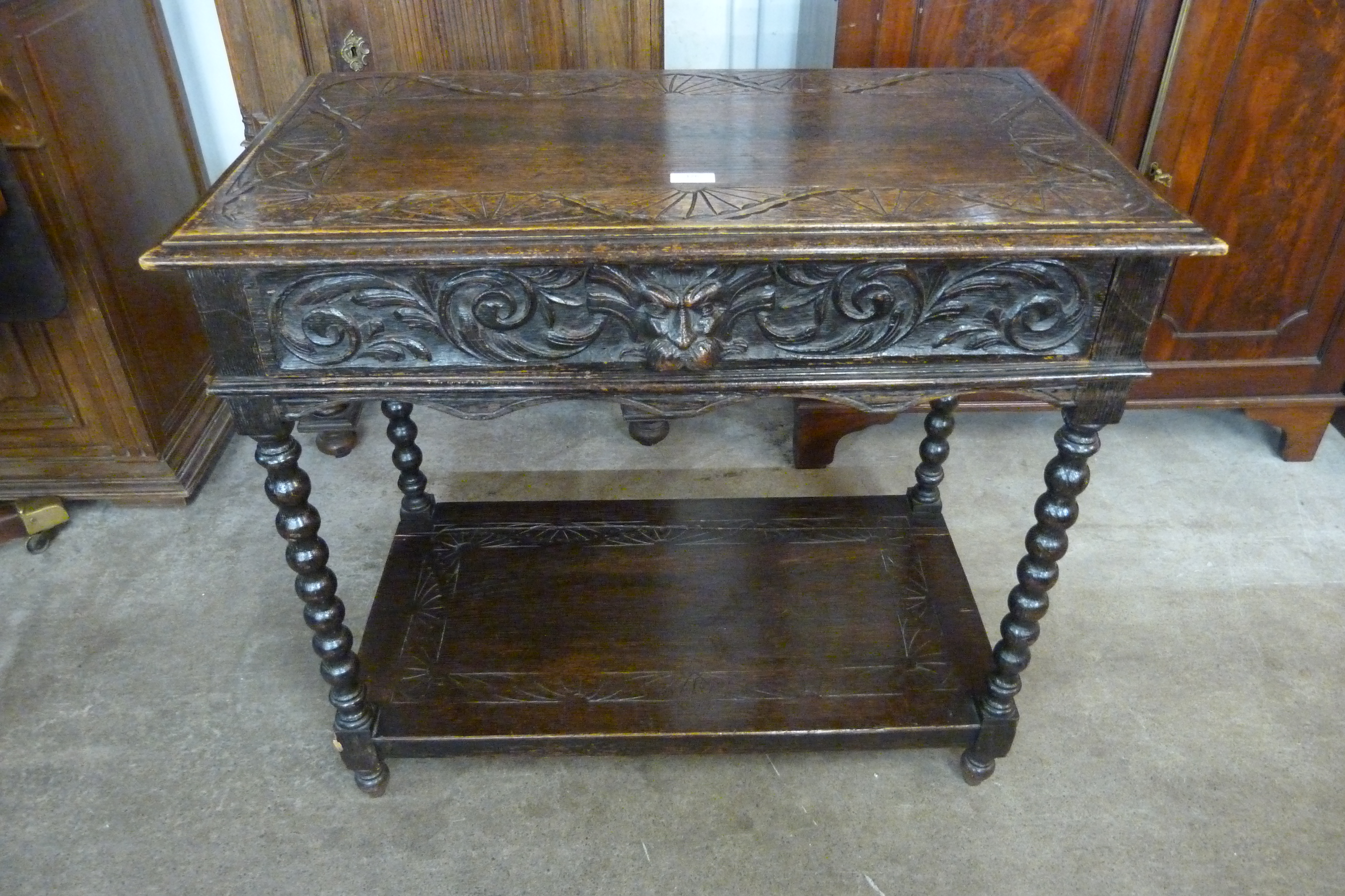 A 17th Century style carved oak single drawer Greenman side table - Image 2 of 2