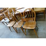 A set of three Ercol Blonde elm and beech Windsor chairs