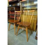 A pair of Ercol elm and beech 608 model chairs