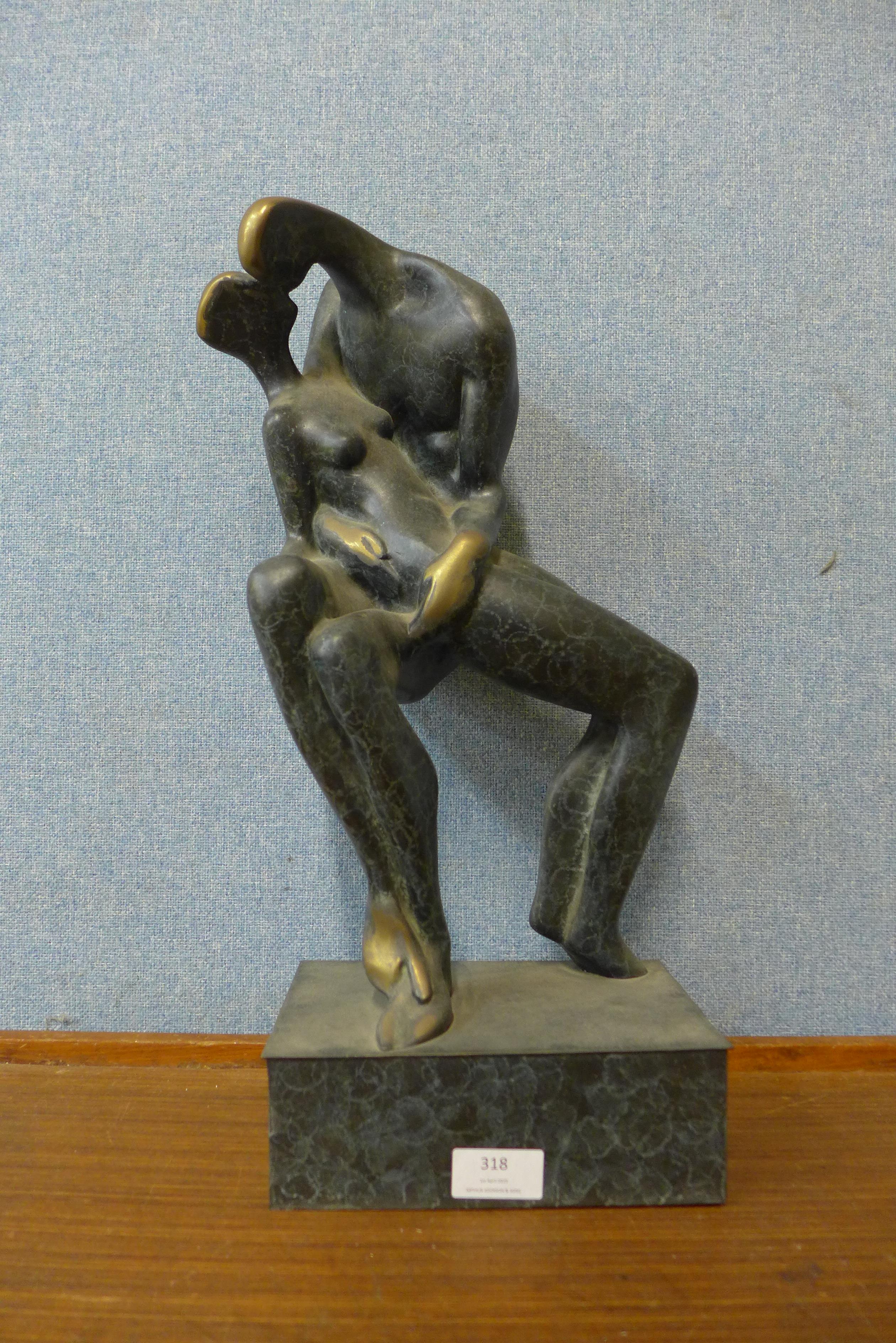 A bronze abstract figure of two lovers