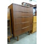 A teak chest of drawers