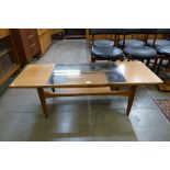 A G-Plan Fresco teak and glass topped rectangular coffee table