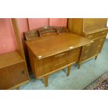 A Jentique teak metamorphic desk /chest of drawers