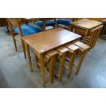 A Poul Hundevad teak nest of tables