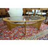 A G-Plan Astro teak and glass topped oval coffee table