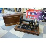 An early 20th Century original Victoria cased sewing machine