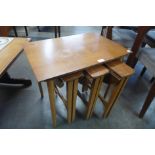 A Poul Hundevad teak nest of tables