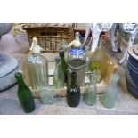 Assorted vintage glass bottles