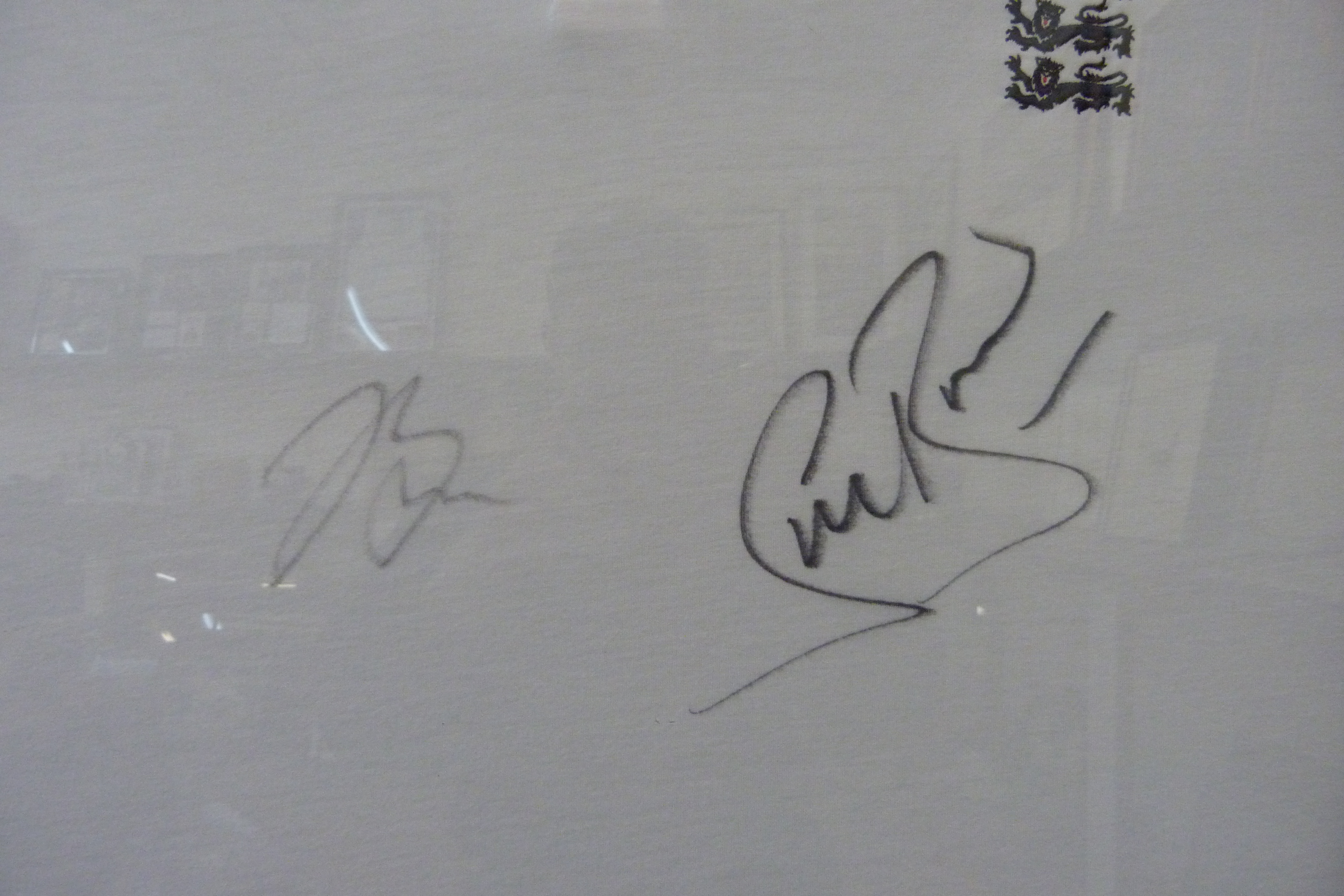 A framed autograph display, England Waitrose Sponsored cricket shirt, Stuart Broad and Jake Bell - Image 2 of 2