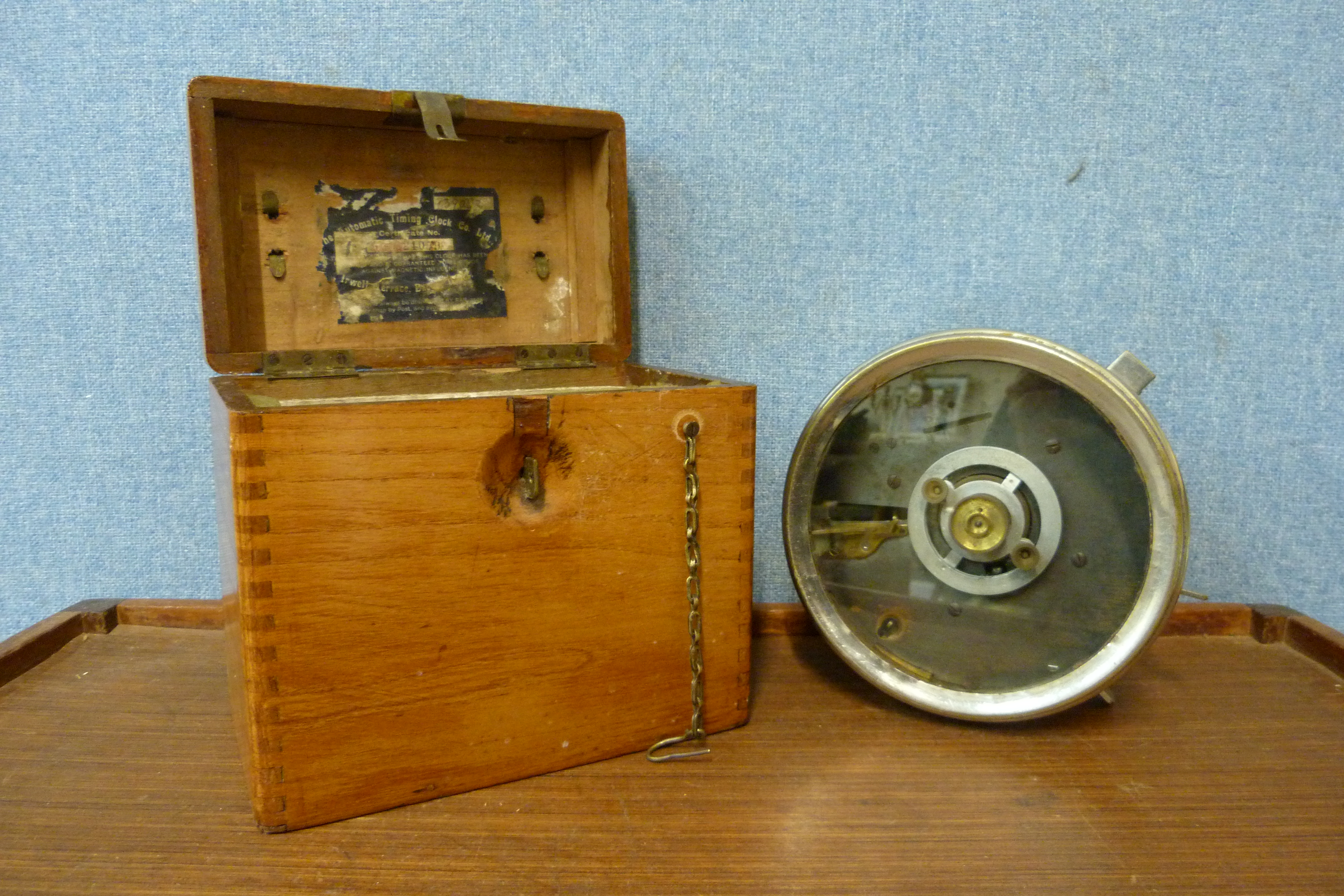 A vintage cased pigeon racing clock