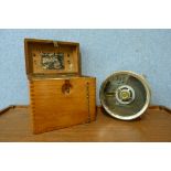 A vintage cased pigeon racing clock